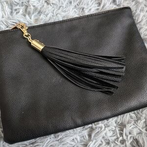 Black Pebble faux leather clutch with tassel